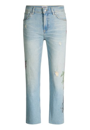 Lichtblauwe spijkerbroek met gestikte voorzakken, subtiel verouderd effect en bloemen- en palmbomendruk op de pijpen.