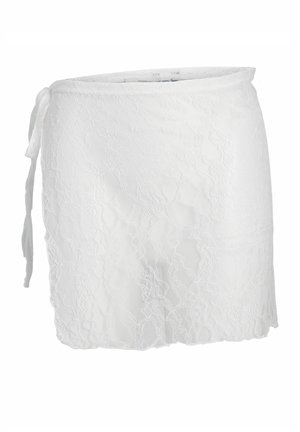 Gonna a portafoglio in pizzo bianco con motivo floreale e chiusura laterale a fiocco, lunghezza al ginocchio, tessuto leggero e semi-trasparente.