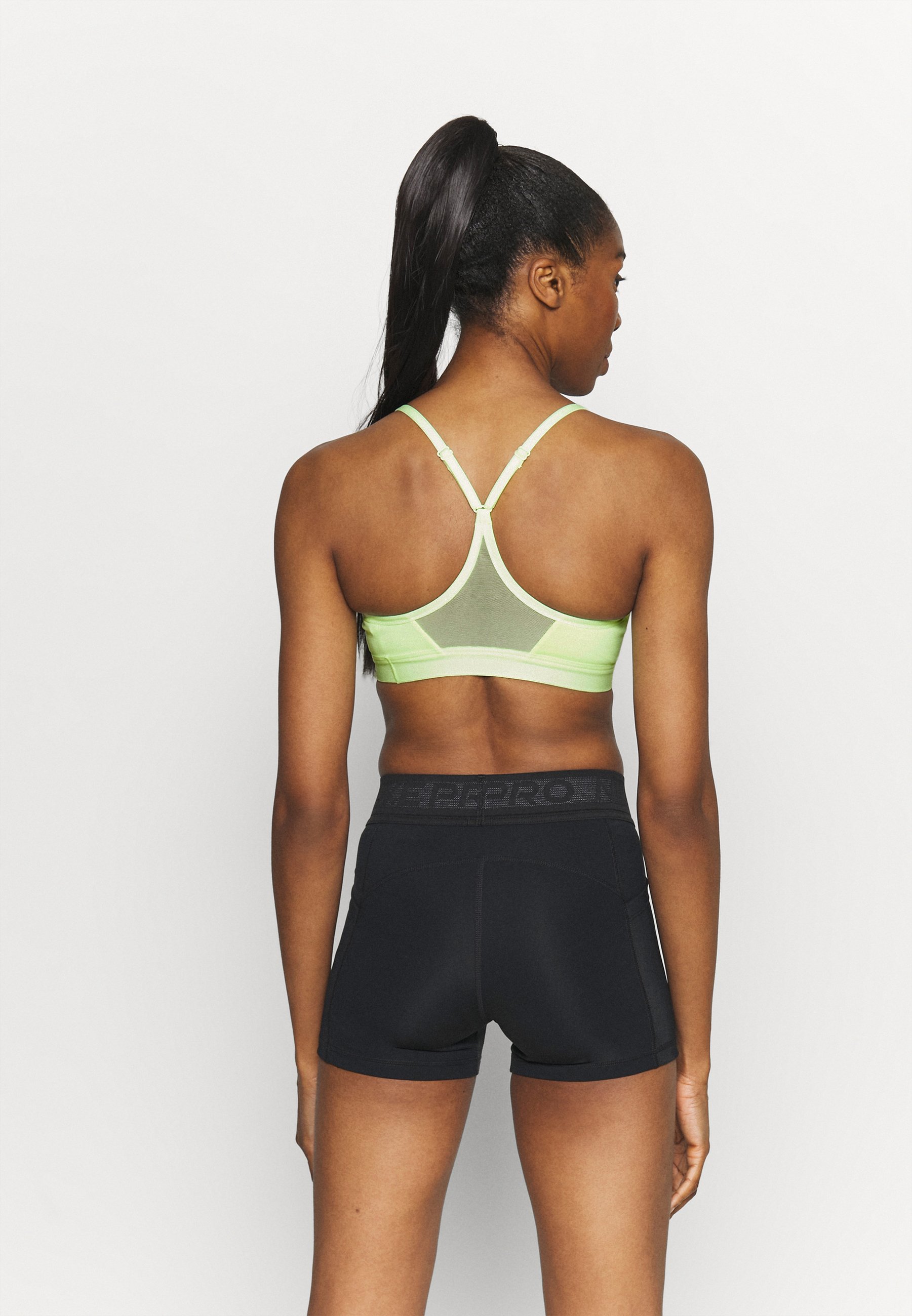 Nike Performance INDY BRA - Light support sports bra - barely  volt/black/neon yellow - Zalando.ie