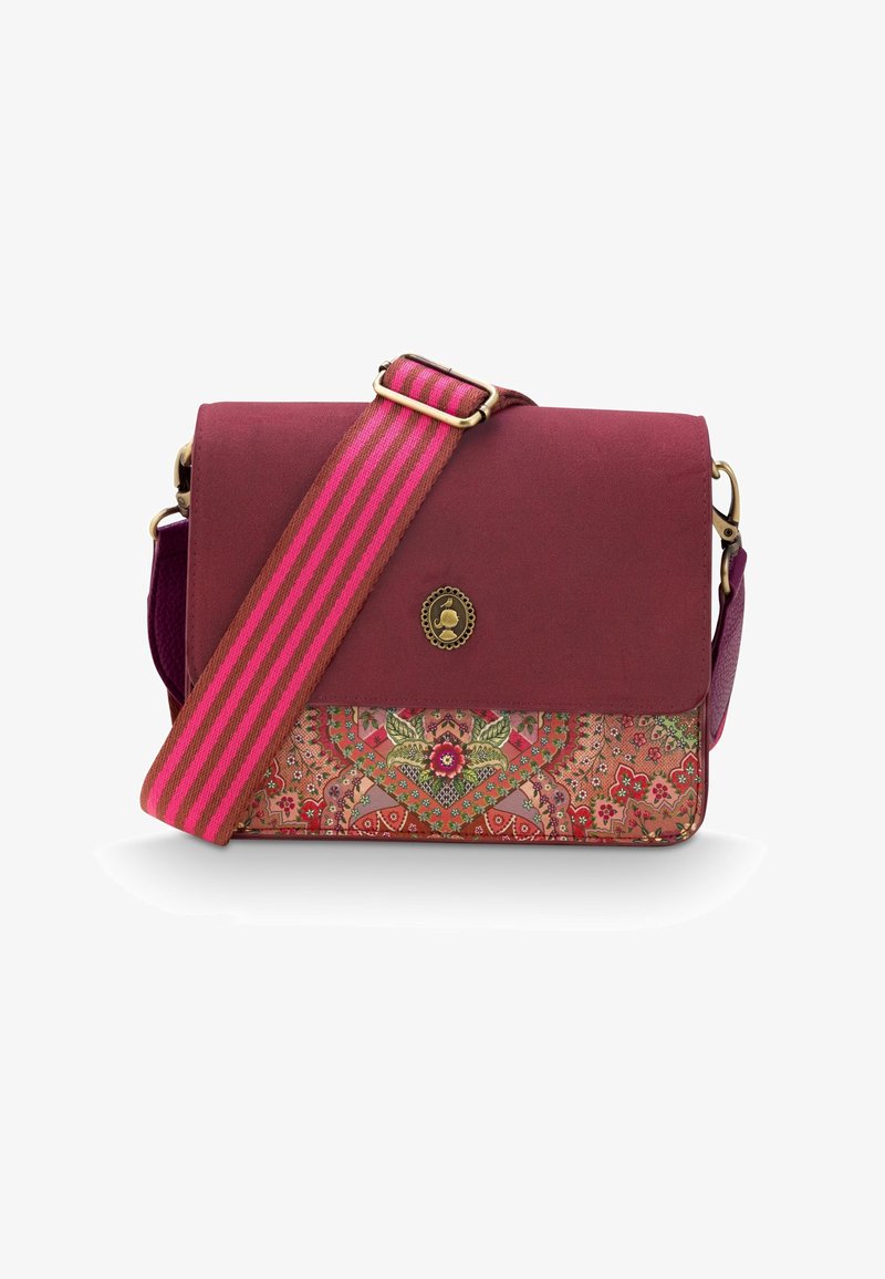 Purple and patterned crossbody bag with a floral print, magnetic flap closure, and a striped adjustable strap. Gold-tone hardware accents.