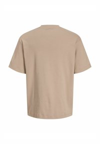 Beige t-shirt met korte mouwen, gemaakt van zachte katoen. Kenmerkt zich door een ronde halslijn en een ontspannen pasvorm met een gladde, onversierde stofstructuur.