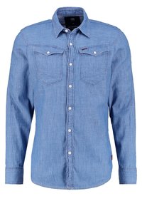 Lichtblauwe spijkerblouse met lange mouwen, knoopsluiting aan de voorkant, twee borstzakken en witte knoopaccenten. Glad materiaal en klassiek kraagontwerp.