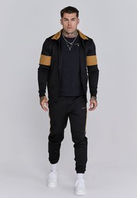 SIKSILK MUSCLE FIT JOGGERS - Tracksuit bottoms - black