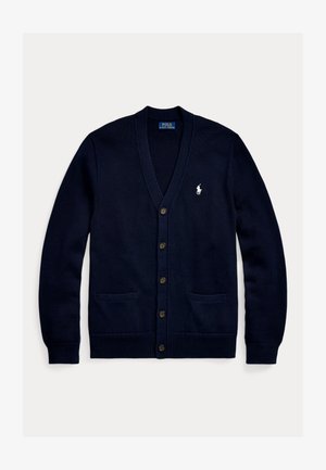 Granatowy sweter z dzianiny z dekoltem w kształcie V, zapinany na guziki, z dwoma przednimi kieszeniami i małym białym logo na piersi. Miękka tekstura i luźny krój.