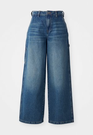 Weite Jeanshose in mittlerem Blau mit leichter Ausbleichung, hoher Taille, traditionellem Fünf-Taschen-Design und verstärkter Naht.