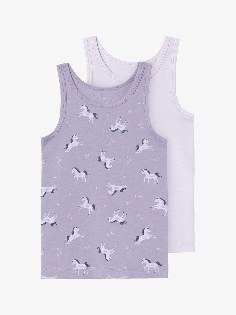Two tank tops: one lavender with a unicorn and star print, and one plain white. Both have wide straps and a soft cotton texture.