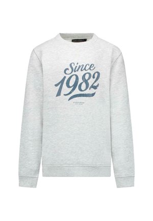 Lichtgrijze sweatshirt van zachte stof met een donkere opdruk "Since 1982" en "Studio Goods" daaronder, met ribgebreide manchetten en zoom.