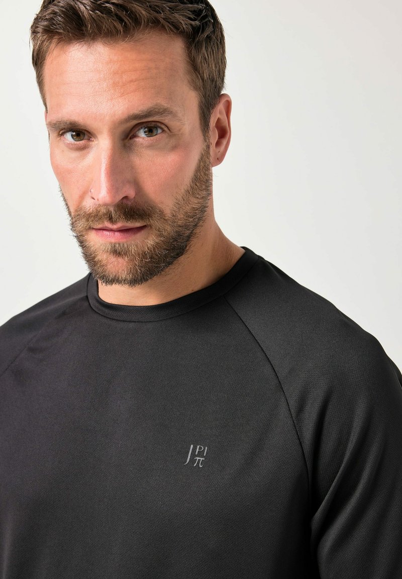 T-shirt technique à manches courtes, avec technologies FLEXNAMIC® et QuickDry - collection Fitness, noir