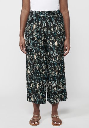 Pantalons culottes noirs à motif floral avec une taille élastique, ornés de fleurs claires et de accents verts, fabriqués dans un tissu doux et léger.