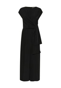Combinaison noire en tissu doux, avec un design à enfiler à l'avant, des manches courtes et un détail noué à la taille. Silhouette à jambe large.