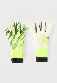 Guantes de portero Puma en verde brillante y negro, con palmas acolchadas, correas ajustables en la muñeca y diseños gráficos en el dorso.