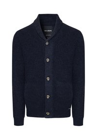 Cardigan lavorato a maglia color blu navy con collo sciallato, caratterizzato da cinque bottoni di legno e trama a coste. Maniche lunghe e design aderente.