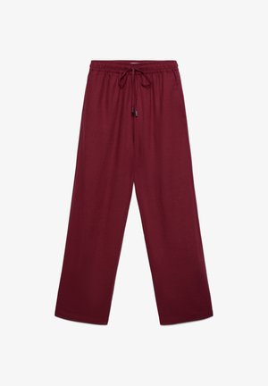Pantalon large bordeaux avec ceinture élastique et cordon de serrage, fabriqué en tissu léger.