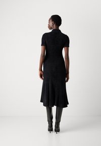 Lacoste Džemperkleita - black