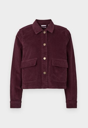 Burgunderfarget kordfløyelsjakke med krage, fem messing trykknapper og to lommer foran. Strukturert stoff med lange ermer og kort design.