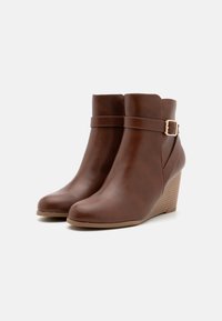 Anna Field Bottines à talons hauts - cognac