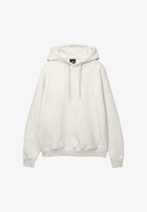 Hellgrauer Hoodie aus weichem Stoff. Mit einer Tasche auf der Vorderseite, einer Kordelzugkapuze und gerippten Bündchen und Saum. Lässiger, übergroßer Schnitt.