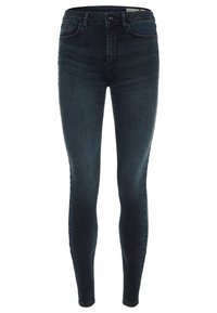 Jeans ajustados de color azul oscuro con cinco bolsillos, cierre de botón y cremallera, y sutil desgaste en los muslos y las rodillas.