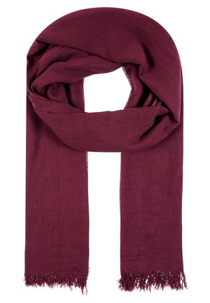 Maroon fabric scarf with fringed ends, loosely looped, displaying soft texture and lightweight material.