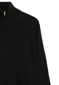 Maglione nero con colletto alto e mezza cerniera. Tessuto morbido e testurizzato con un design semplice e lineare. Nessun motivo o accento visibile.
