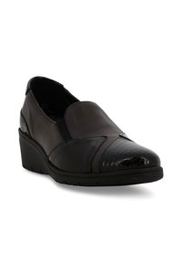 Scarpe slip-on in pelle nera con punta in pelle a forma di serpente testurizzata e gore elastico. Presentano un tacco a zeppa e una soletta imbottita. Taglia 37.