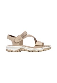 Sandale beige à bout ouvert avec brides réglables, semelle rembourrée et semelle extérieure en caoutchouc texturé pour le confort et le maintien en extérieur.