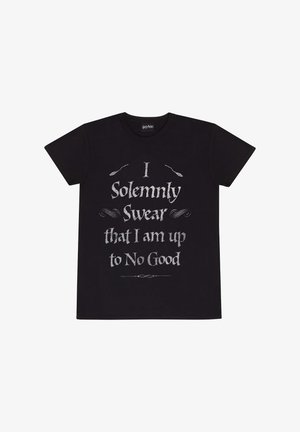 Sort t-shirt med korte ærmer med hvid tekst: "Jeg lover højtideligt, at jeg ikke har nogen gode hensigter." Enkel design, bomuldsmateriale.