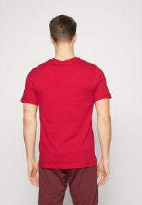 Nike Performance Camiseta estampada - red