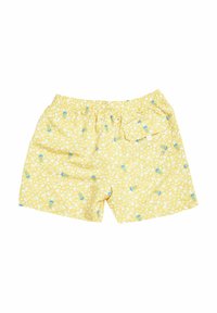 Costumi da bagno gialli con un motivo di meduse e coni gelato, cintura elastica e una tasca posteriore con chiusura a scatto. Tessuto leggero.