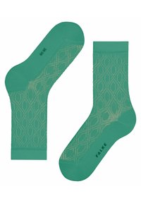 Grüne Socken mit einem Rautenmuster, aus weichem Material mit einer strukturierten Oberfläche. Markenname "FALKE" an der Seite aufgedruckt.