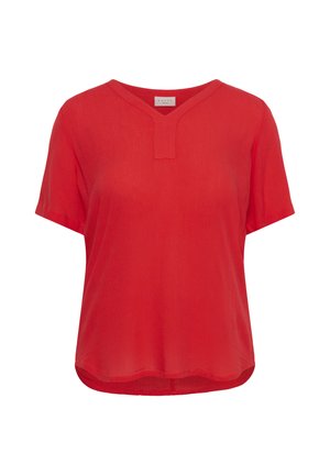 Blouse rouge à manches courtes avec un tissu texturé et une petite encolure en V, dotée d'un ourlet légèrement arrondi.