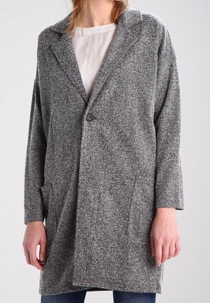 Cappotto grigio a spina di pesce con una vestibilità rilassata, chiusura con un bottone e due tasche laterali, realizzato in un tessuto tessuto testurizzato.