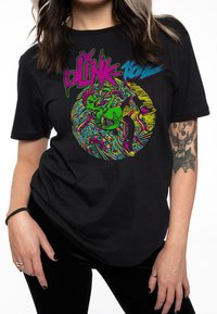 Black cotton t-shirt featuring colorful graphic print with a skull and punk elements in neon pink, green, and blue, set against a black background.