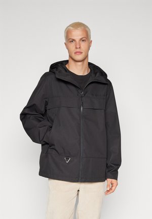 Tommy Jeans OUTDOOR CHICAGO - Summer jacket - black