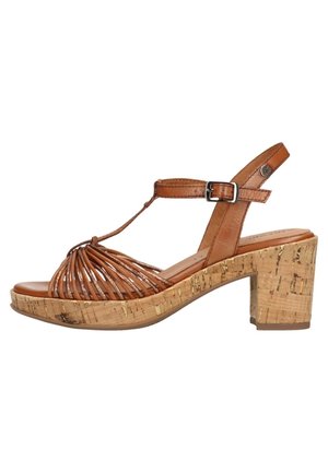 Bruine leren wedge-sandalen met een kurken platform. Uiterst voorzien van een geweven bovenwerk en een verstelbare enkelband. Gesloten teen met een blokhak.