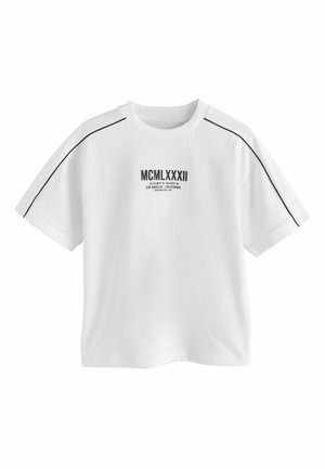 White cotton t-shirt with short sleeves, featuring a black graphic "MCMLXXXII" and additional text on the chest, outlined with black piping.