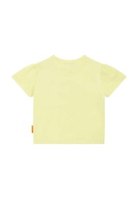 Kurzes gelbes Baumwoll-T-Shirt mit kurzen Puffärmeln und rundem Halsausschnitt. Verfügt über ein kleines Etikett an der linken Seitennaht.
