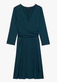 Teal midiklänning med långa ärmar, V-ringning och omslagdesign. Har en plisserad kjol och textil med struktur för en flytande silhuett.