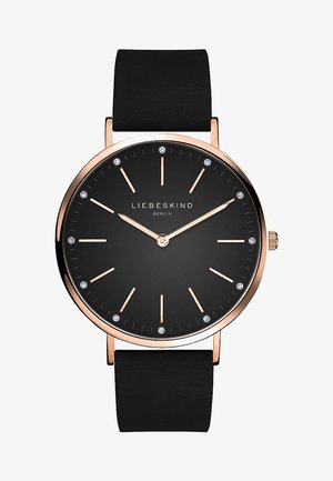 Schwarze Uhr mit rundem Ziffernblatt, roségoldenen Akzenten, minimalistischer Gestaltung und funkelnden Stundenmarkierungen. Verfügt über ein schwarzes, strukturiertes Armband.