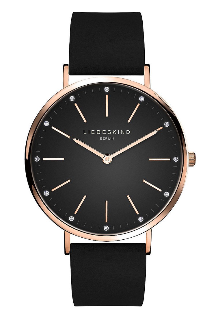 Schwarze Uhr mit rundem Ziffernblatt, roségoldenen Akzenten, minimalistischer Gestaltung und funkelnden Stundenmarkierungen. Verfügt über ein schwarzes, strukturiertes Armband.