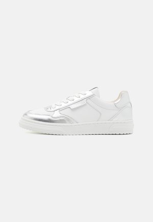 White sneaker with silver accents and a smooth leather and synthetic upper. Features a padded tongue, round toe, and textured outsole.