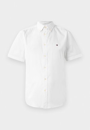White short-sleeve button-up shirt, lightweight cotton fabric, classic collar, featuring a small embroidered logo on the left chest.