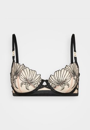 Black floral lace bra with a nude underlay, featuring intricate embroidery, adjustable straps, and a geometric, crisscross design at the front.