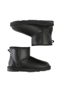 Schwarze Lederankelstiefel mit runder Zehenform, weicher Innenausstattung und strukturiertem Gummisohle. Verfügt über doppelte Zuglaschen und seitliche Nähte.