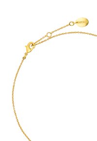 Bransoletka z łańcuszka w odcieniu złota, z zapięciem typu lobster i owalną zawieszką wygrawerowaną napisem „WAGA”. Delikatne ogniwa o gładkiej teksturze.