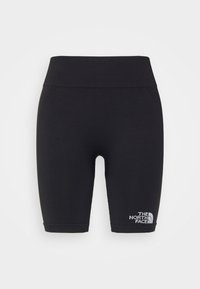 Svarta cykelshorts i stretchigt material. Har en bred midja och en liten vit logotyp på nedre vänstra sidan. Slät yta.