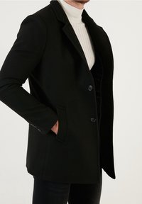 Buratti Abrigo corto - black