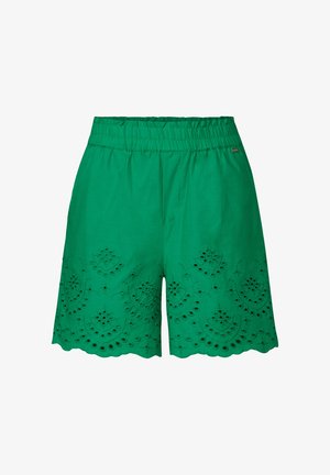 Grüne Baumwollshorts mit bestickten Ösen, gewelltem Saum, elastischem Bund und lockerer Passform. Geeignet für warmes Wetter.