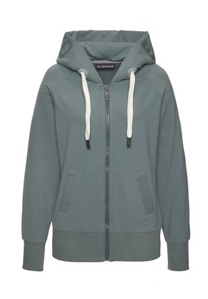 Light teal zip-up hoodie with a drawstring hood, two front pockets, ribbed cuffs, and hem. Features a logo patch on the sleeve. Cotton blend material.