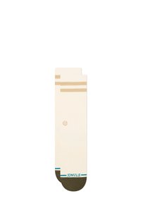 Chaussettes crème avec deux rayures horizontales beige, embout vert foncé et logo turquoise. Le matériau semble lisse avec une coupe ajustée.